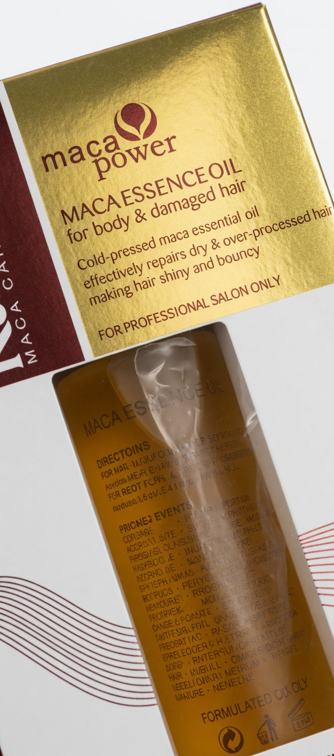 Maca Power Macaessence Oil packaging with gold and red design